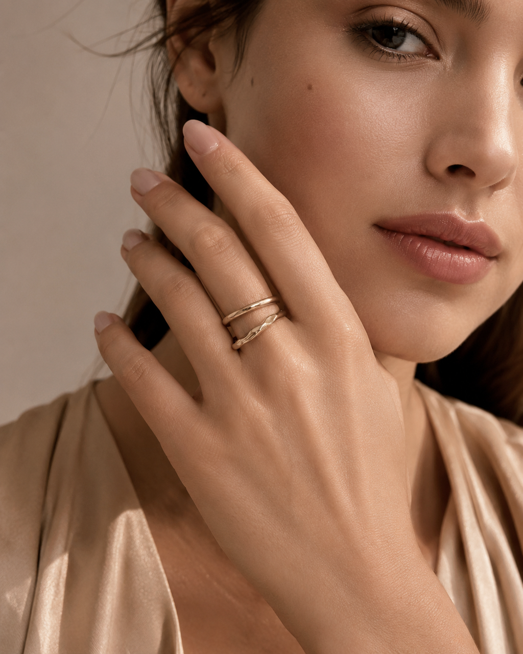 Gold Twisted Wire Stacking Ring Set worn on finger