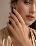Gold Twisted Wire Stacking Ring Set worn on finger
