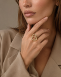 Gold Open Wave Baguette Ring worn on finger