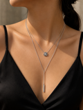 Silver Double-Layer Star Coin & Bar Lariat Necklace Set worn around neck