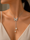 Silver Textured Butterfly Lariat Necklace with Double Pearl Drop worn on model