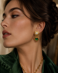 Gold Pearl & Emerald Green Cabochon Hinged Drop Earrings worn on model with green velvet