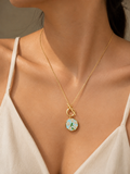 Gold Sky Blue Floral Enamel Coin Pendant Necklace worn around neck