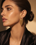 Gold Textured Open Circle Ball Chain Fringe Tassel Earrings worn on model with black satin