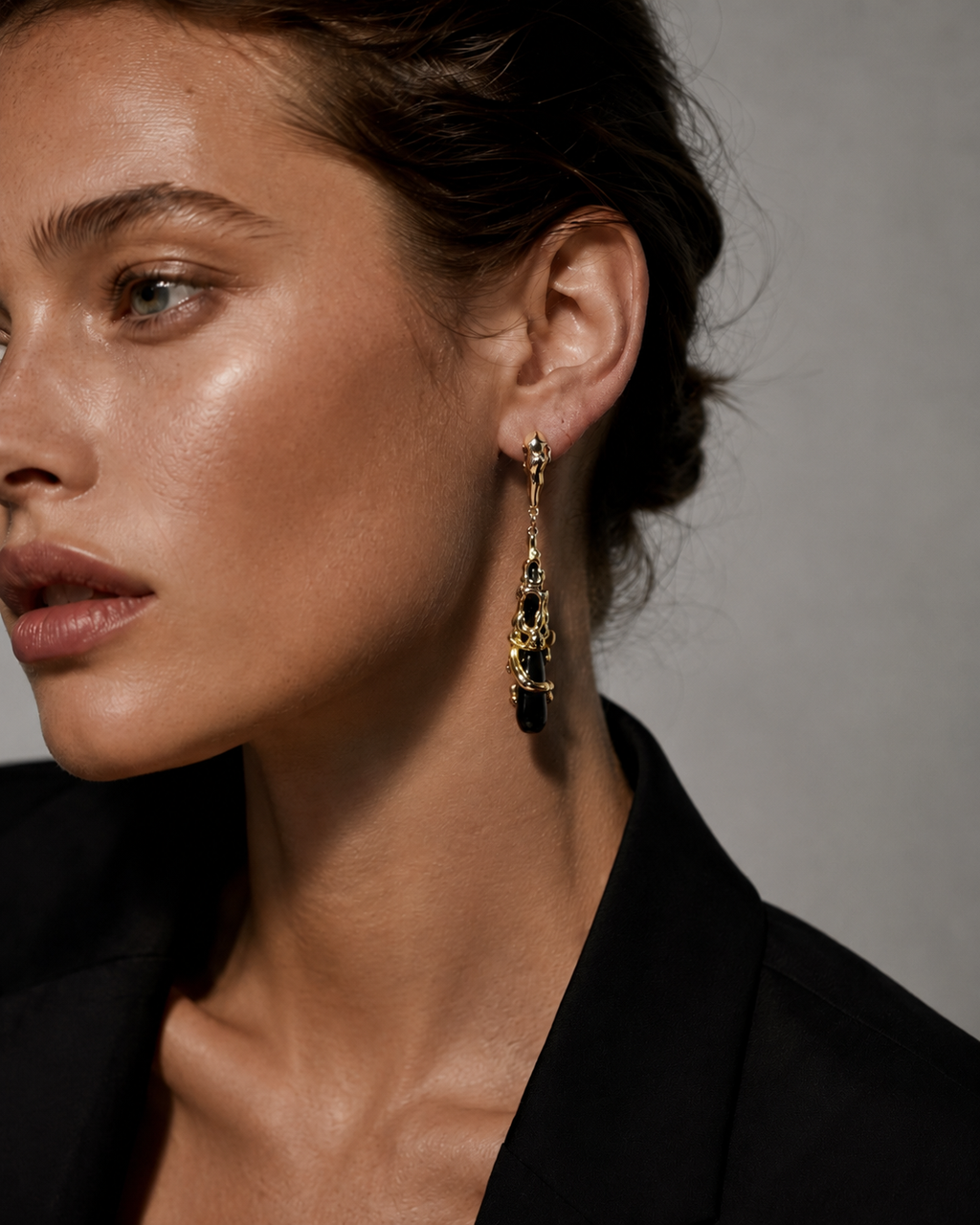 Gold Molten Sculptural Black Onyx Drop Earrings worn on model with black blazer