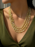 Triple-Strand Prehnite Green Tumbled Bead Necklace worn around neck