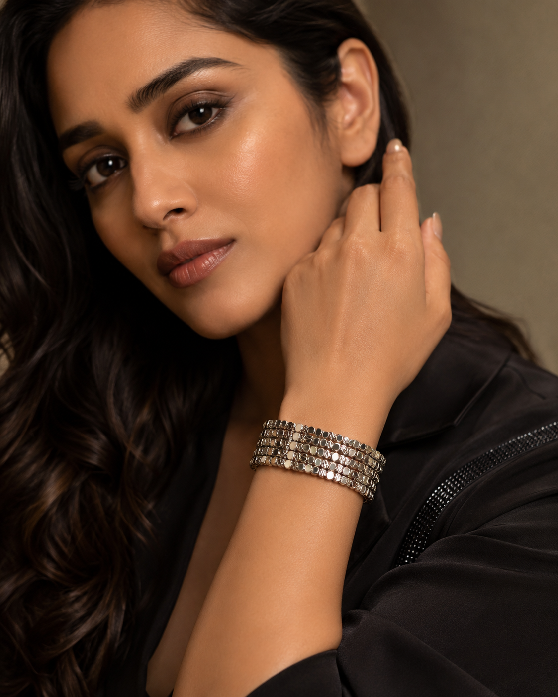 Silver Multi-Strand Sequin Disc Cuff Bracelet worn on wrist with black blazer