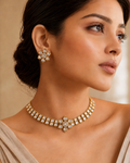Gold Double-Row Square Kundan Polki Choker & Floral Stud Earrings Set worn on model with beige saree