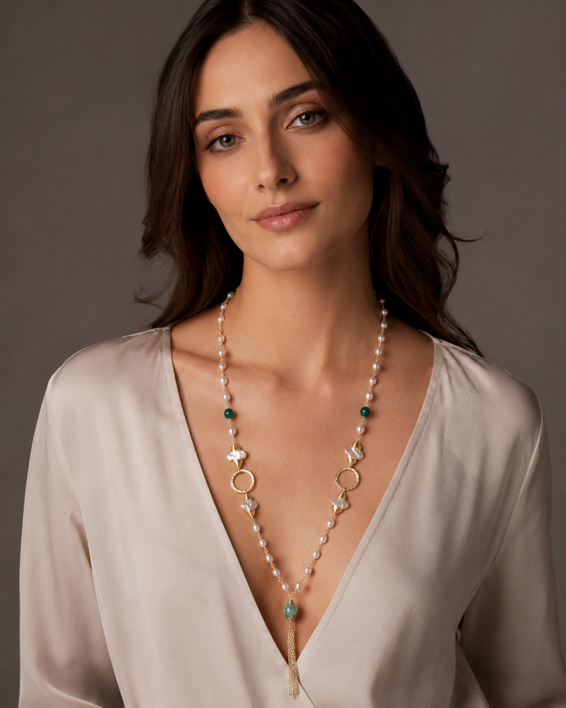 Gold Wire-Wrapped Mother-of-Pearl Flower & Green Onyx Long Lariat Necklace worn on model with beige silk deep V-neck top