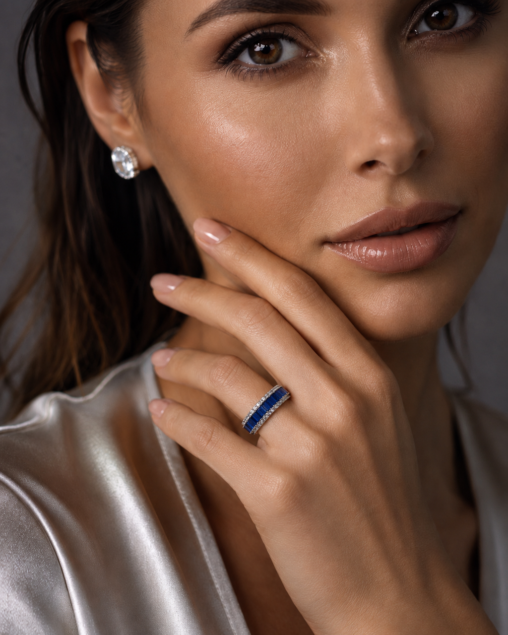 Sapphire Blue Baguette Eternity Band worn on finger