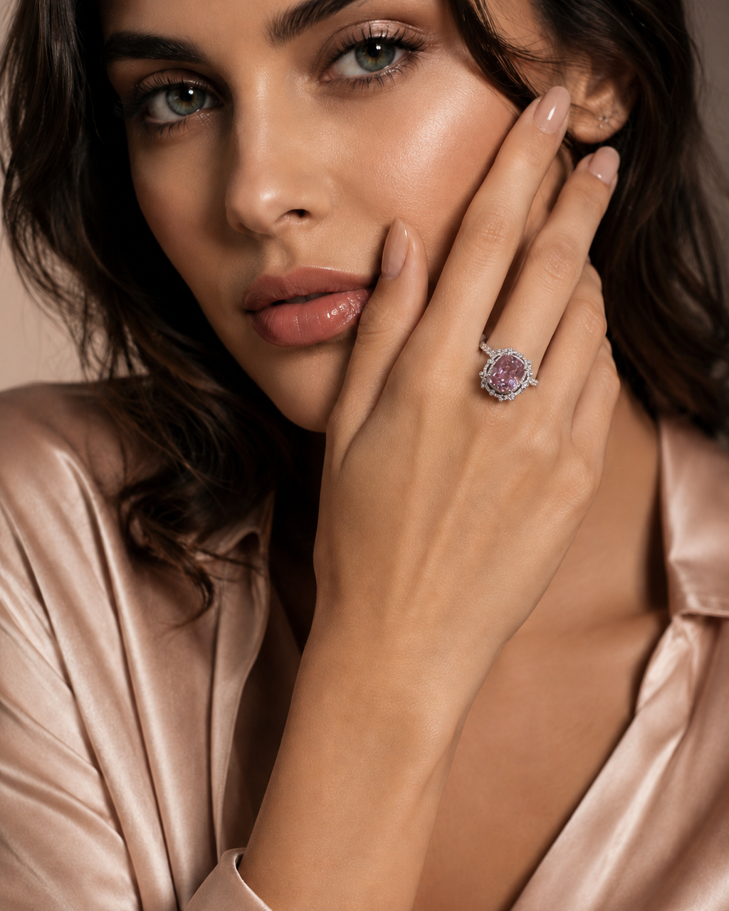 Silver Halo Ring with Blush Pink Oval Stone worn on finger