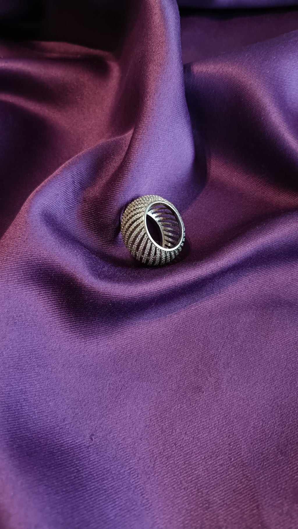 Silver Ribbed Dome Pavé Cocktail Ring top view on purple fabric