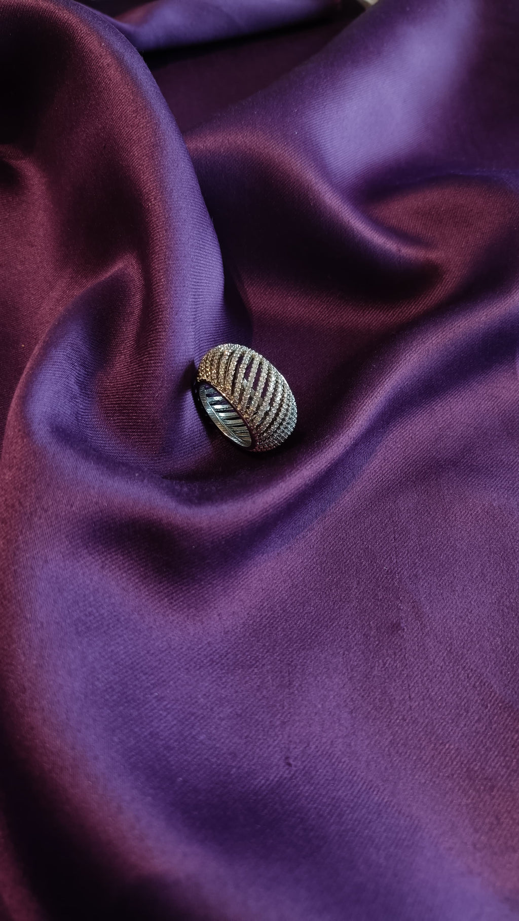 Silver Ribbed Dome Pavé Cocktail Ring side view on purple fabric
