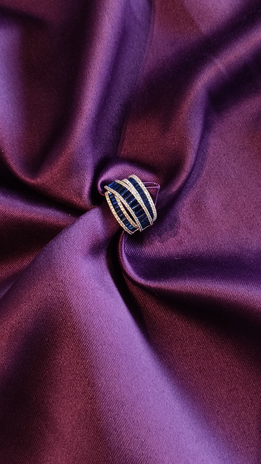 Gold Navy Blue Baguette Multi-Strand Dome Ring top view on purple fabric
