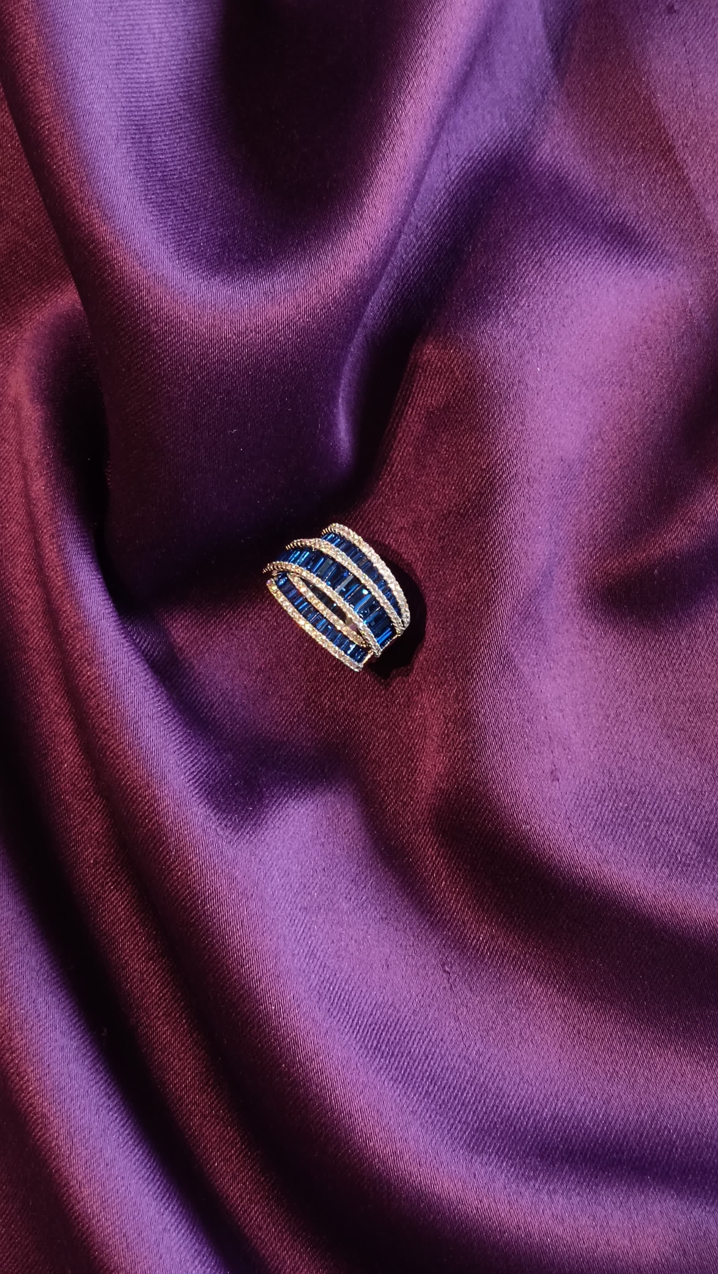 Gold Navy Blue Baguette Multi-Strand Dome Ring side view on purple fabric