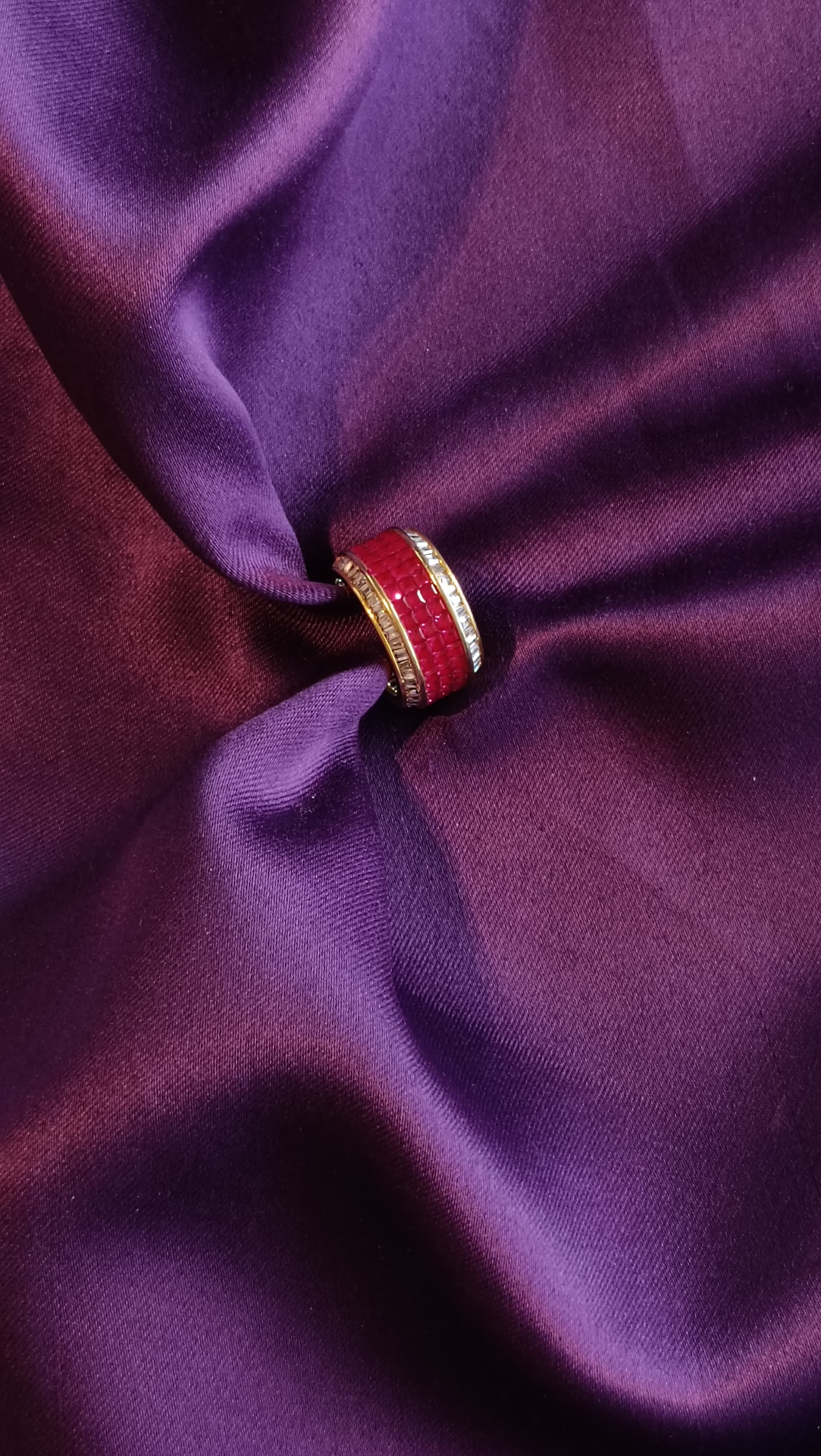 Gold Ruby Red Enamel & Pavé Crystal Wide Band Ring top view on purple fabric
