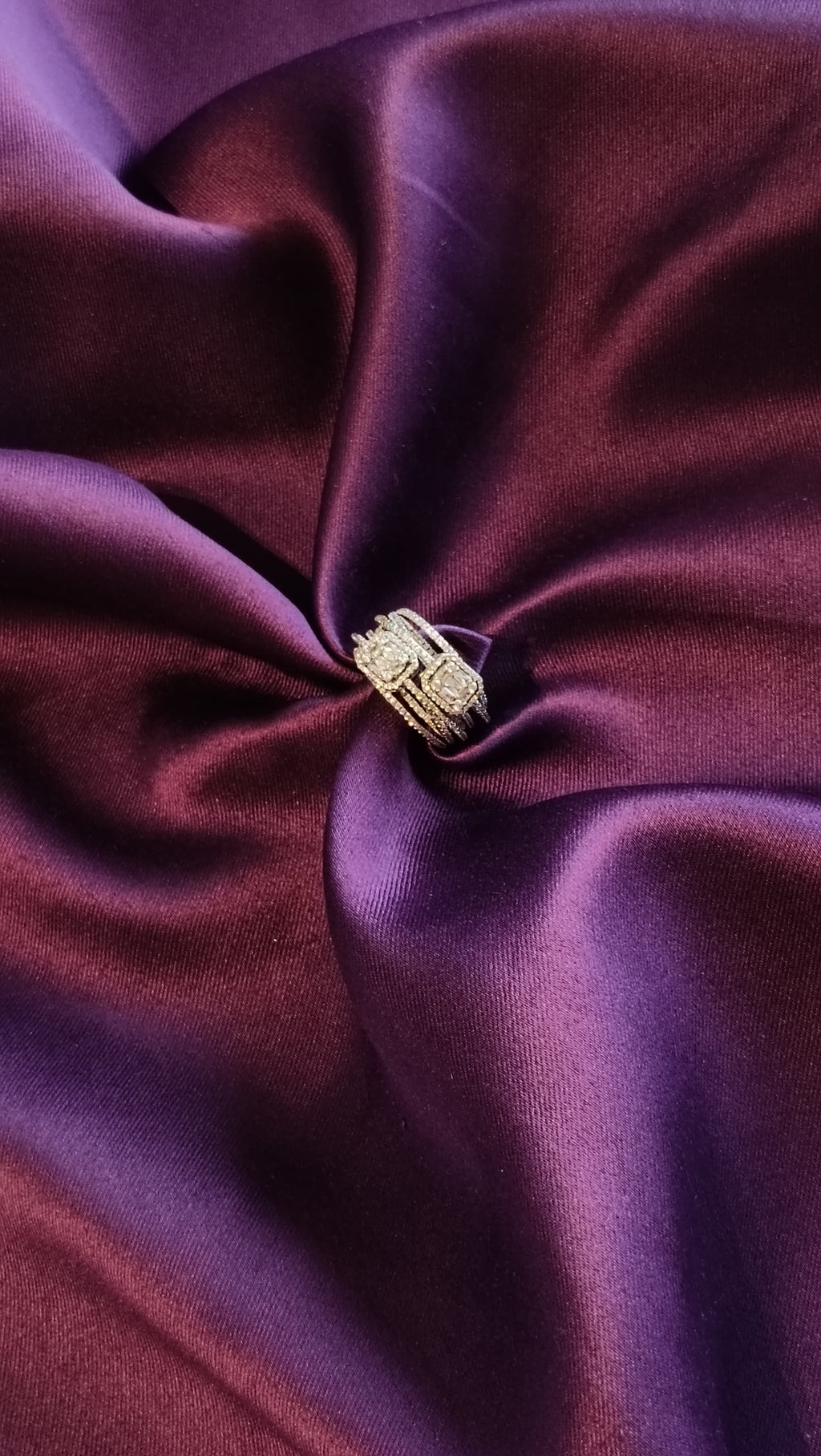 Gold Multi-Strand Cushion Halo Ring top view on purple fabric