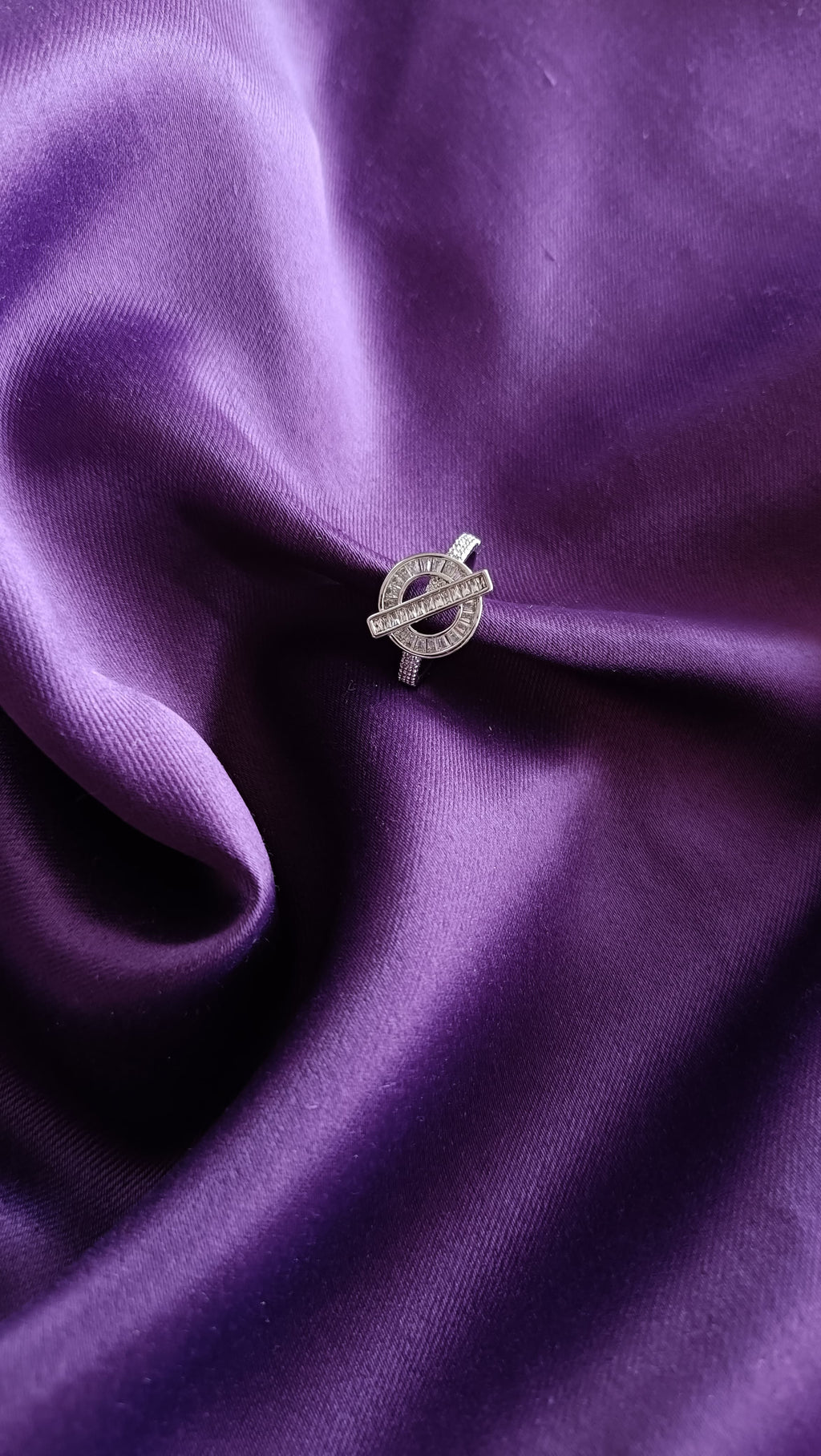 Crystal OT Clasp Silver Ring worn on finger