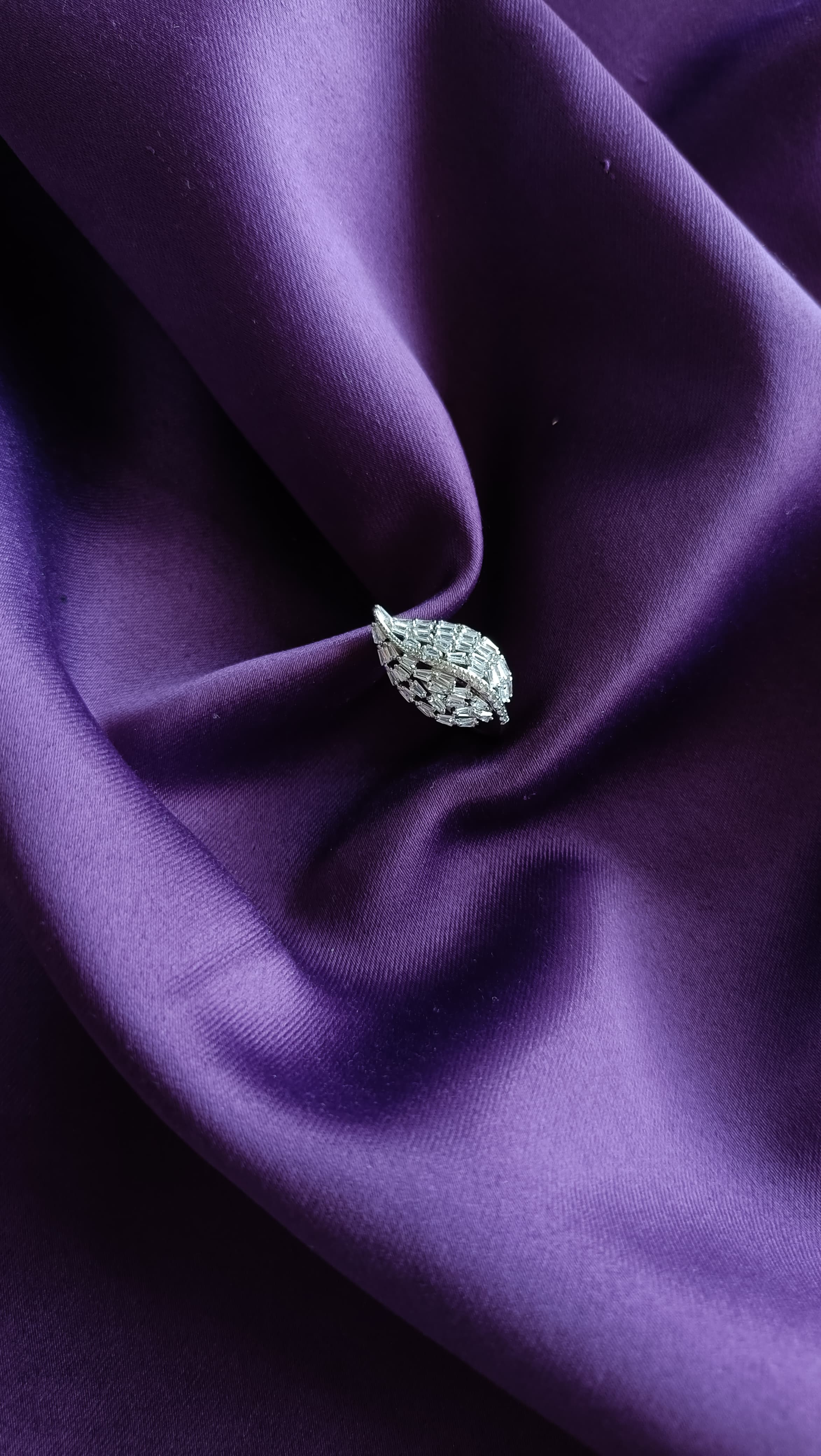 Crystal Leaf Cocktail Ring flat lay on purple fabric