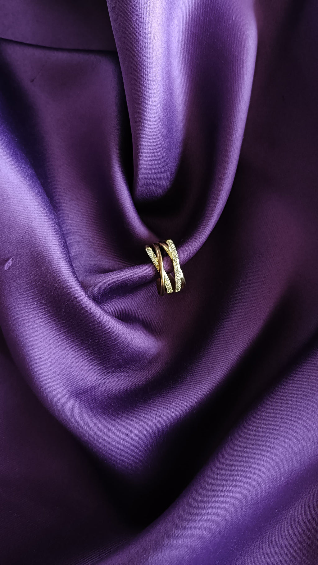 Gold Crossover Pavé Multi-Band Ring side view on purple fabric