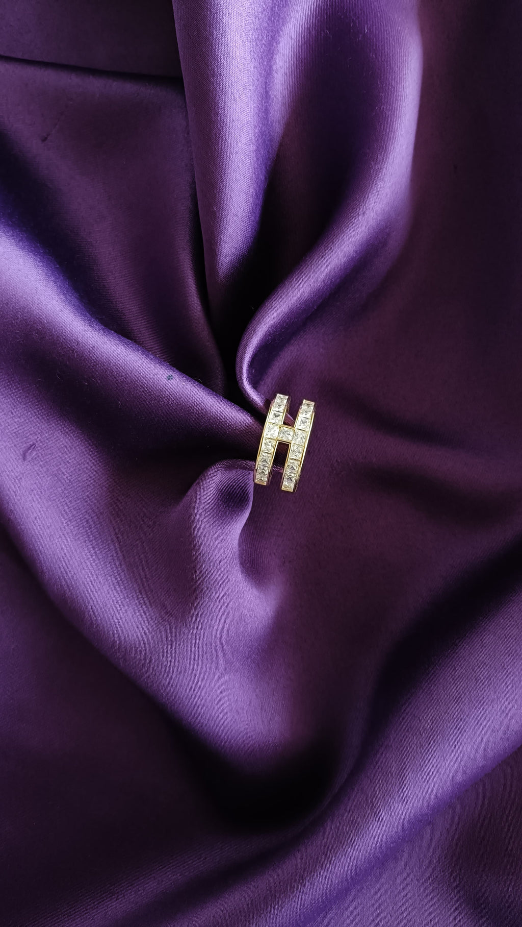 Gold Double Row Princess-Cut Crystal Ring front view on purple fabric