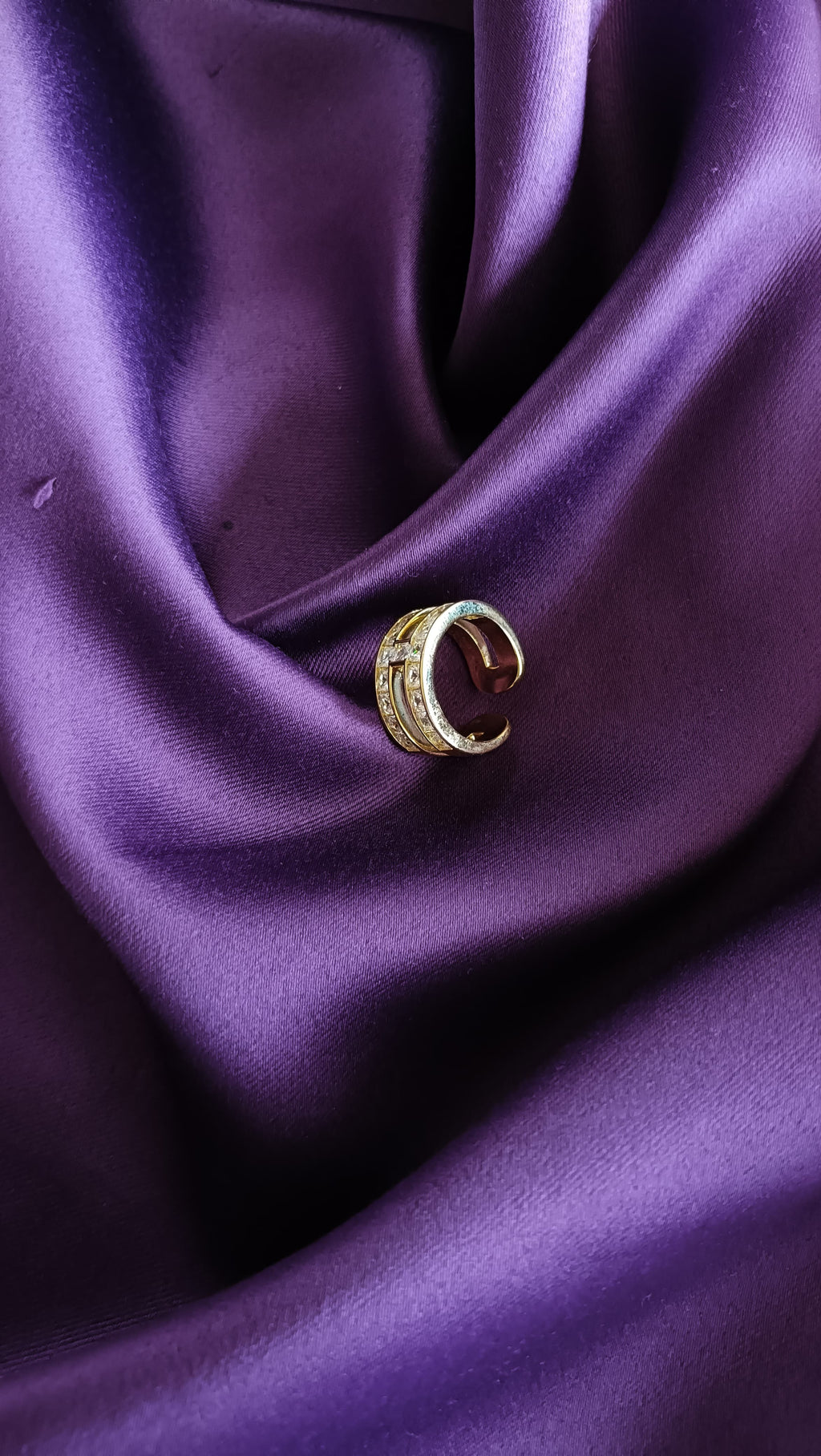 Gold Double Row Princess-Cut Crystal Ring side view on purple fabric