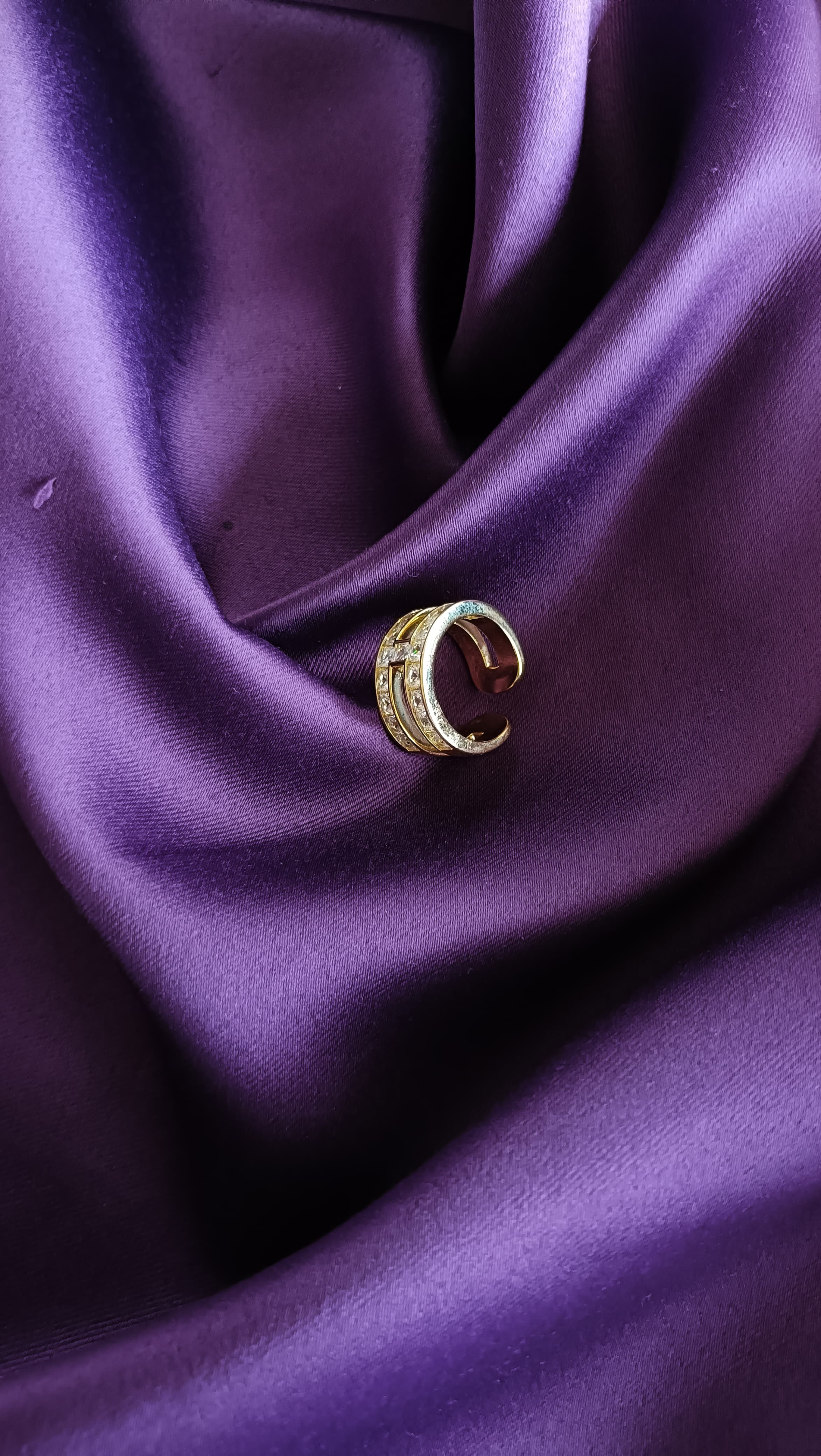 Gold Double Row Princess-Cut Crystal Ring side view on purple fabric