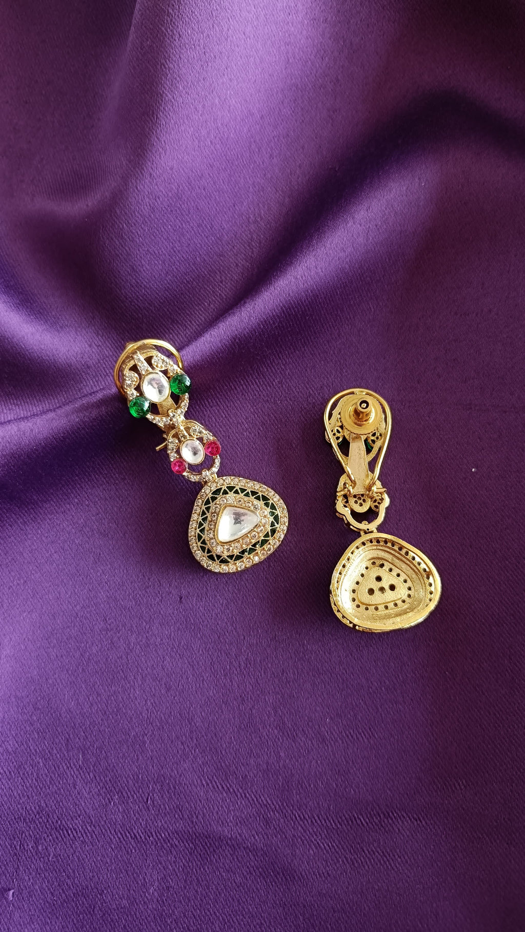 Gold Kundan Polki Ruby & Emerald Long Necklace full length flat lay on purple fabric showing dori cord and tassel