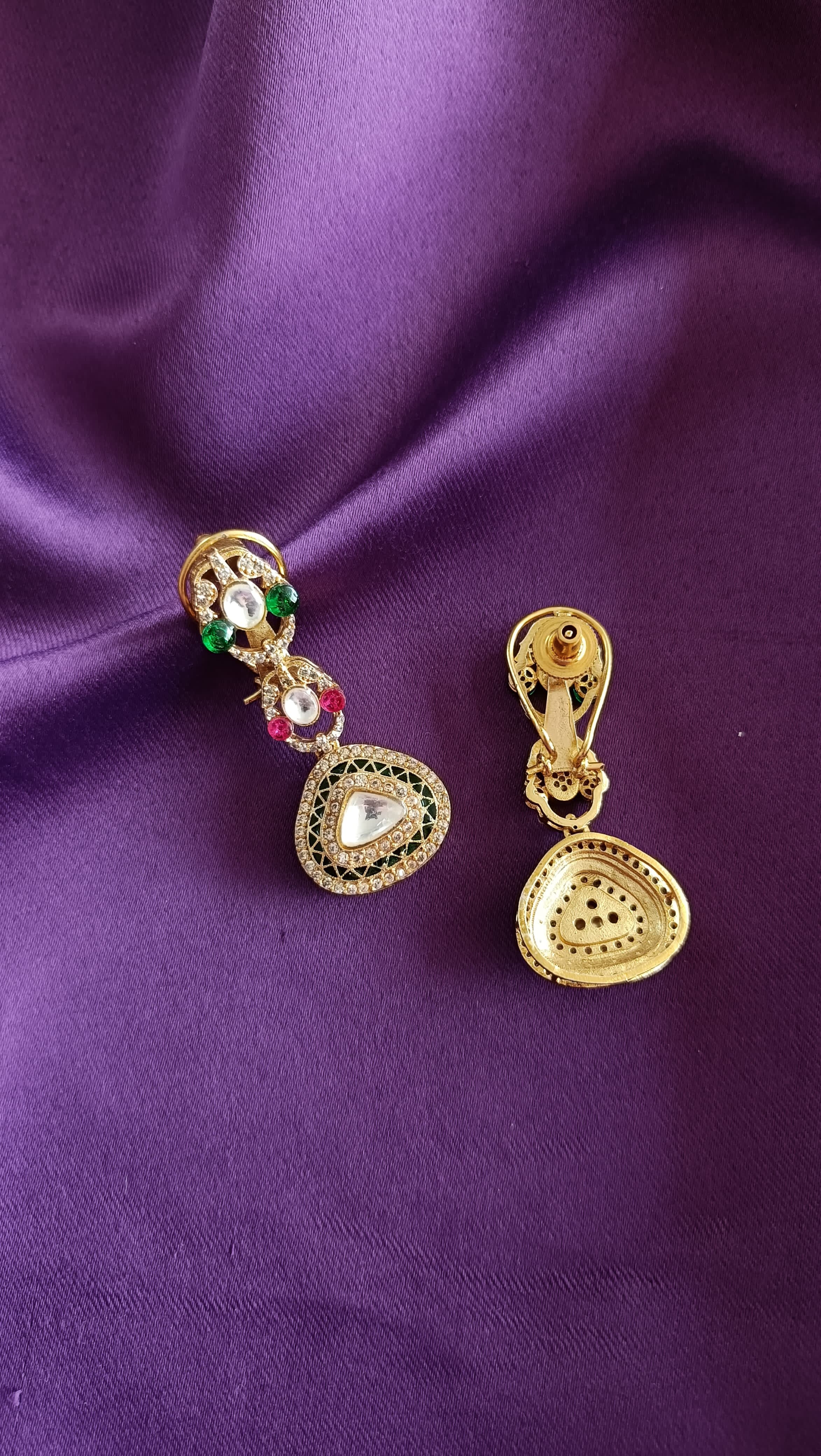 Gold Kundan Polki Ruby & Emerald Long Necklace full length flat lay on purple fabric showing dori cord and tassel